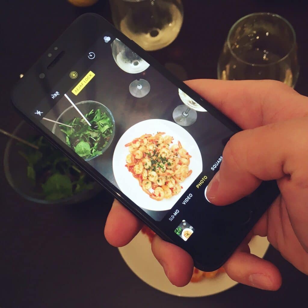 Using phone to photograph food
